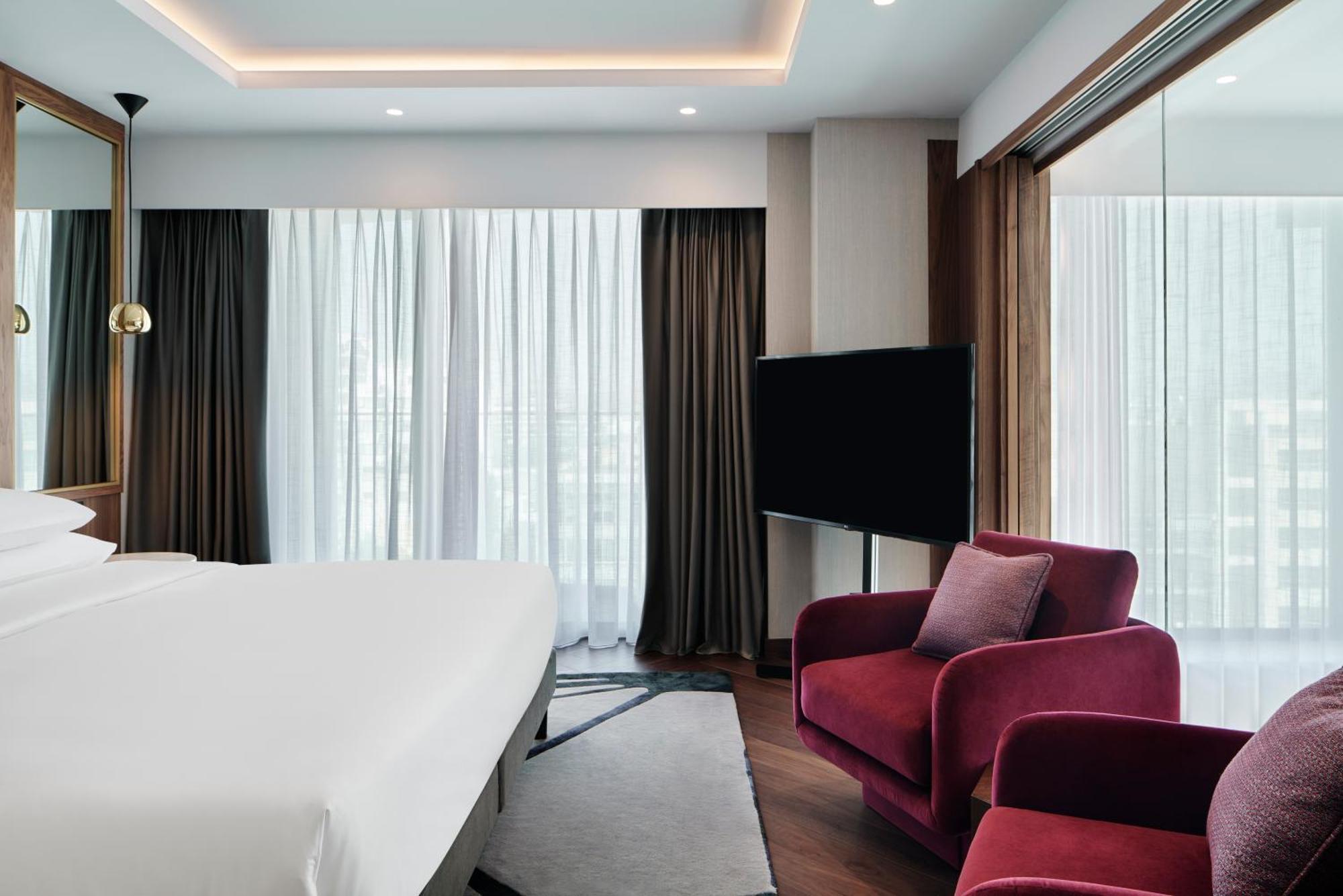 Hotel Grand Hyatt Atene Esterno foto A room at the hotel