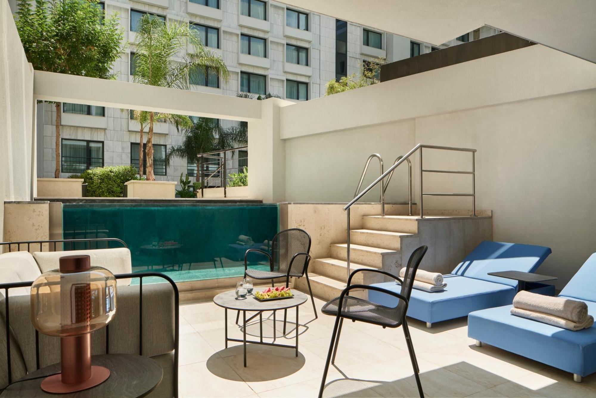 Hotel Grand Hyatt Atene Esterno foto The pool at the hotel